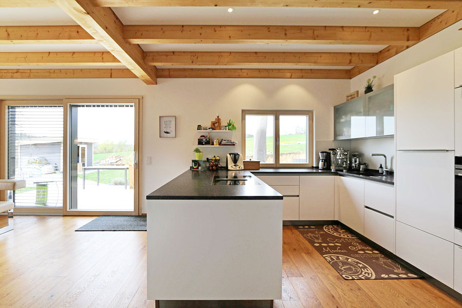 Neubau eines EFH an ein bestehendes Gebäude mit Verbindungssteg, Rohrbach