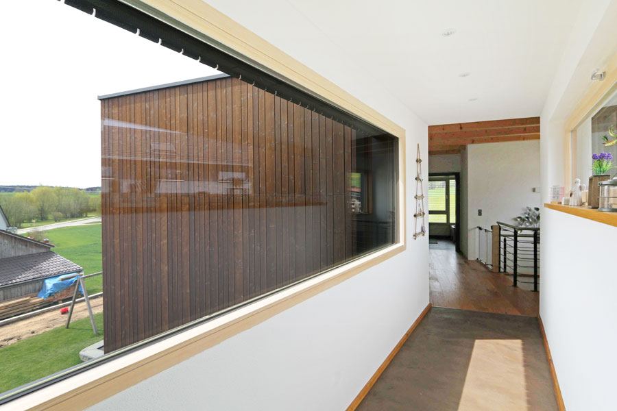 Neubau eines EFH an ein bestehendes Gebäude mit Verbindungssteg, Rohrbach